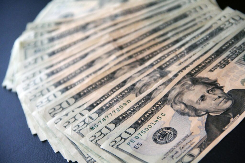 Home 3 Bundle of Money on a Table